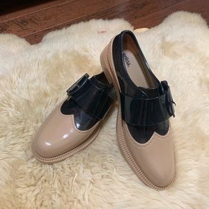 Melissa rubber loafers in tan & black. Size 8.